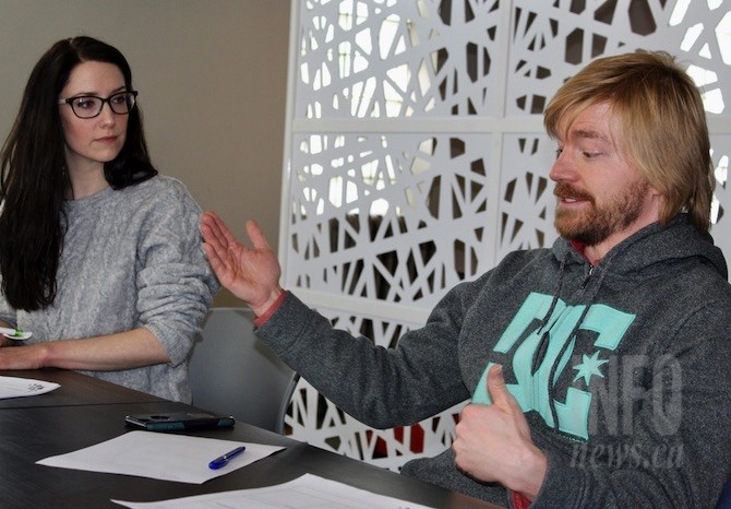 Host Lauren Hjalmarson looks on as musician Patrick Gilmore suggests the city offer grants to music venues in Kelowna.