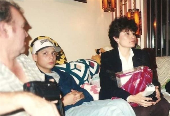 Jason is pictured with his grandfather and mother, Jennifer in this undated photo.