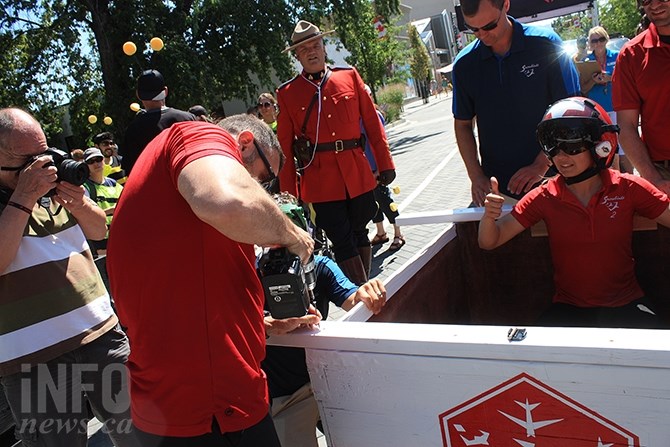 The Snowbirds do a little repair work prior to winning this year's Peach Bin Race.