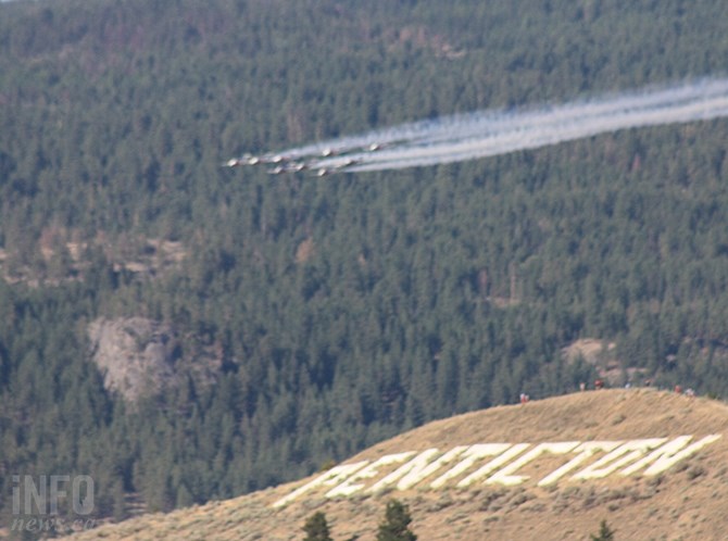 Snowbirds flying over Munson Mountain.