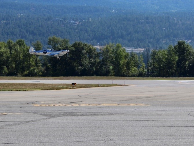 A Silver Spitfire making an around the world flight lands at the Kelowna airport, Thursday, Sept. 5, 2019. 