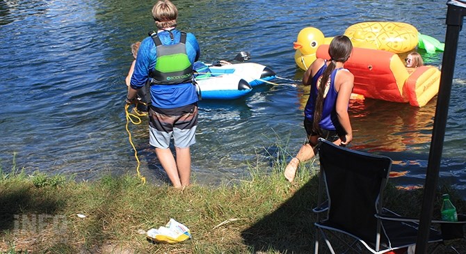 Max Burko and Jenessa Kruger assist a group of channel floaters who  accidently went beyond the exit point on Thursday, July 23.