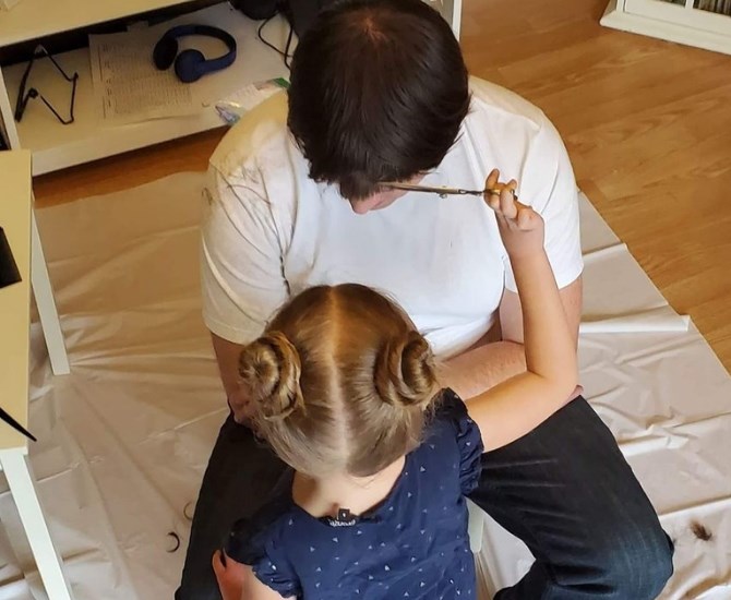 Nathaniel Martin let his daughter cut his hair to raise awareness and funds for mental health and domestic violence services in Kamloops. 