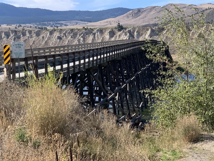 Pritchard Bridge with old style wooden trestles and arch showing.