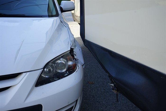 The front end of the Mazda's driver's side was in the way of the trailer's slide for the thief who stole a pickup truck in Summerland.