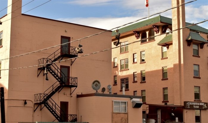 Mack's friends said his shoes now hang in a row of others on this telephone line near the Plaza Hotel in downtown Kamloops.