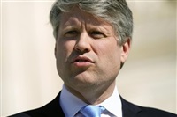 FILE - Nebraska Attorney General Mike Hilgers speaks with members of the media outside the Supreme Court on Capitol Hill, Feb. 28, 2023, in Washington.