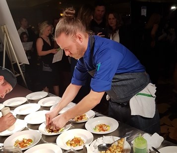 Chef Robins plating his winning dish.